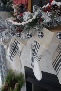 Buffalo check Christmas living room decor flocked garland and stockings black white and red christmas decor