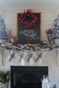 Buffalo check christmas decor fireplace living room mantle black white red merry and bright sign flocked tree