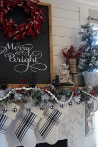 buffalo check christms large sign on mantle with black white and red