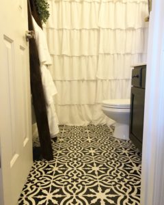 Budget bathroom makeover, stencil floor, painted floor, painted cabinet, diy, cheap project