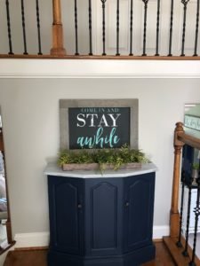 furniture makeover with paint, taking this sentimental accent cheste from cream and brown to navy and gray!