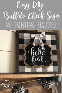 Learn how to make this easy DIY Buffalo check sign that doesn't even require painting! Cute for fall or change out the sign for any season!
