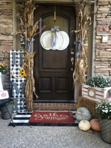 Easy DIY buffalo check porch board! Perfect for any season to spruce up the front of your home!