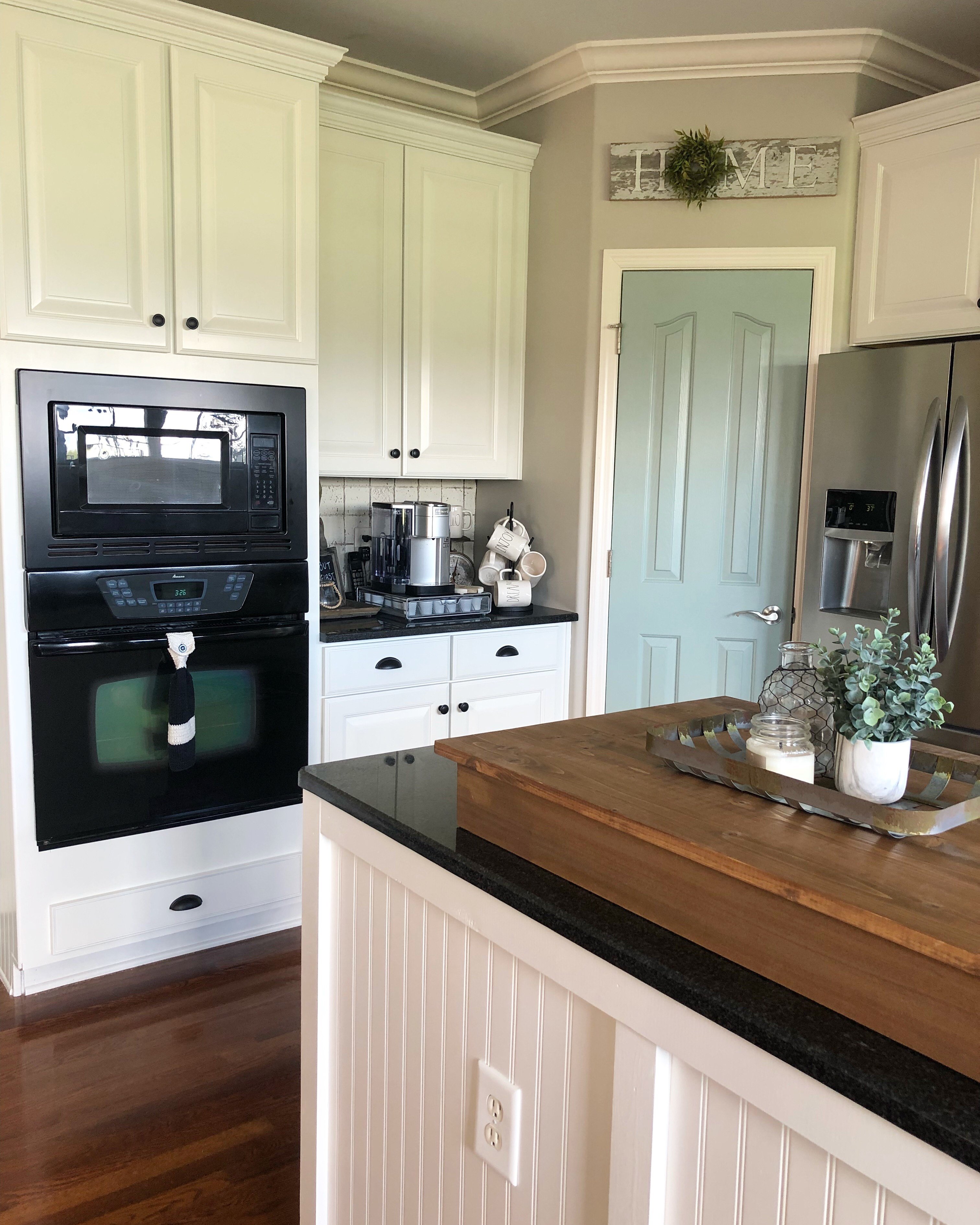 My painted kitchen cabinet makeover…before, after and everything in between!