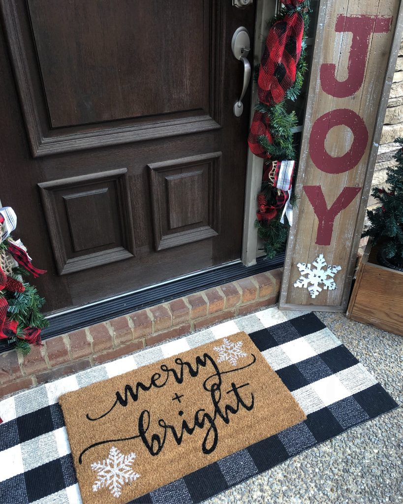 Christmas front porch with Kirkland's door mat and porch board sign Wilshire Collections