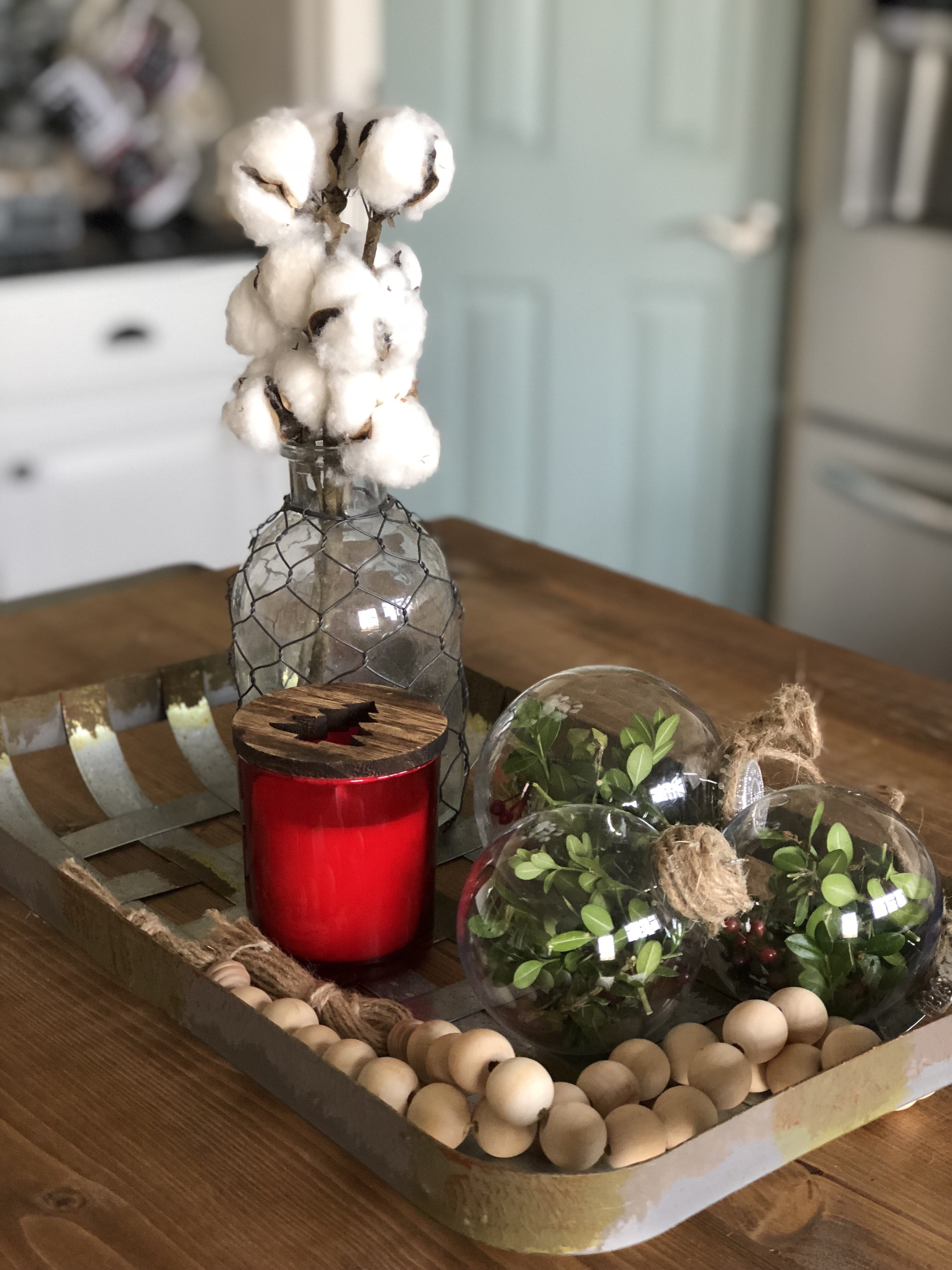 DIY Christmas ornaments with real greenery used in a basket