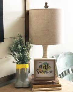Lemon decor with buffalo check accents in my spring entry way this year