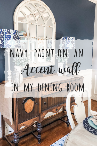 Navy paint on an accent wall brought a bold pop to my dining room transformation!