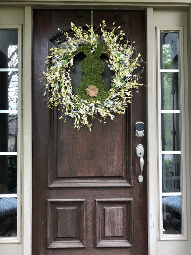 5 minute Easter craft- Peel and stick moss bunny on the front door inside wreath