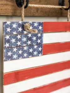 Easy pallet wood flag made with Hobby Lobby supplies for a quick patriotic DIY