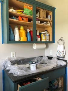DIY painted cabinets, painting laundry room cabients teal