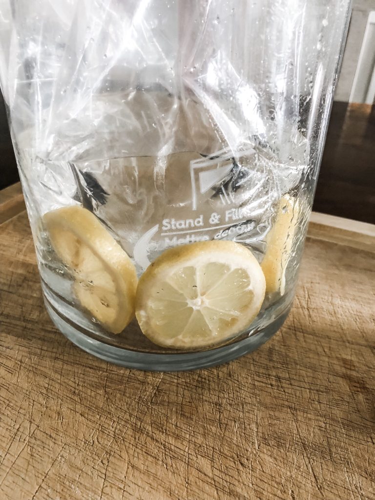 Lemon vase floral centerpiece hack- using a ziploc bag