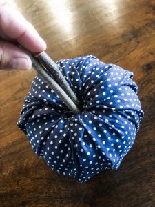Easy no sew fabric pumpkins with cinamon sticks for stems