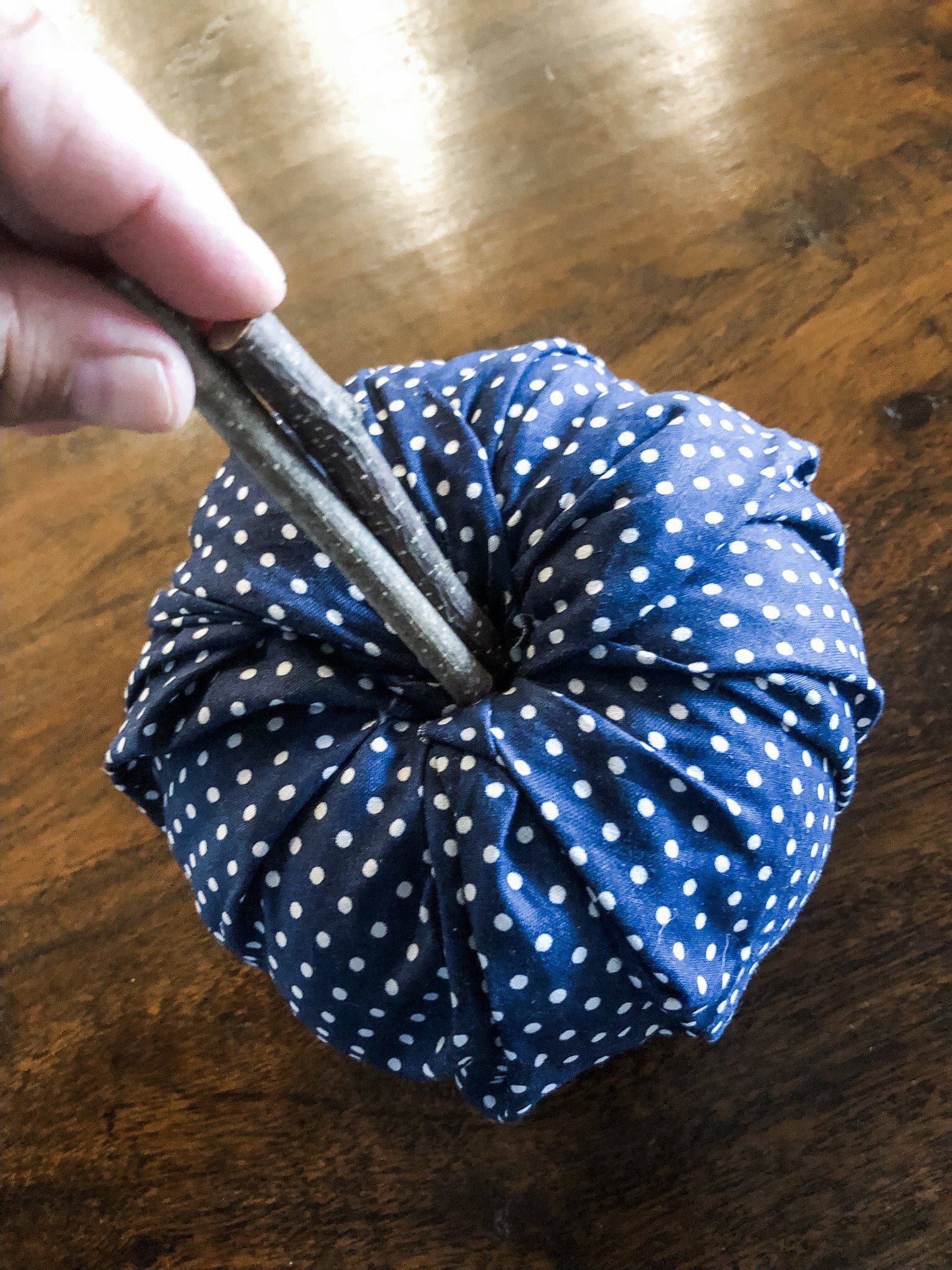 Easy no sew fabric pumpkins made from dollar tree foam pumpkins