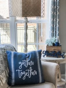 Fall living room ideas using navy, copper and sage green decor!