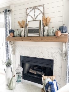 Fall living room ideas using navy, copper and sage green decor!