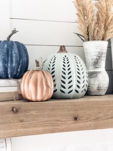 Fall living room ideas using navy, copper and sage green decor!
