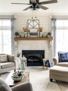 Fall living room ideas using navy, copper and sage green decor!