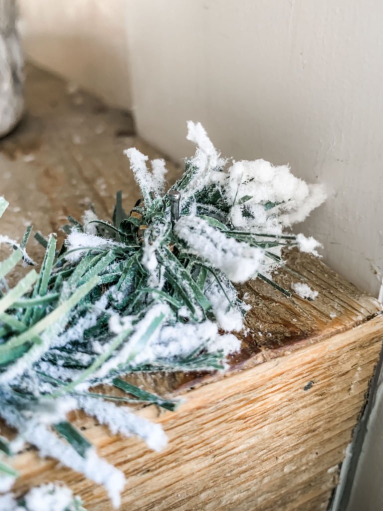 How to hang garland on your mantel this Christmas! Wilshire Collections