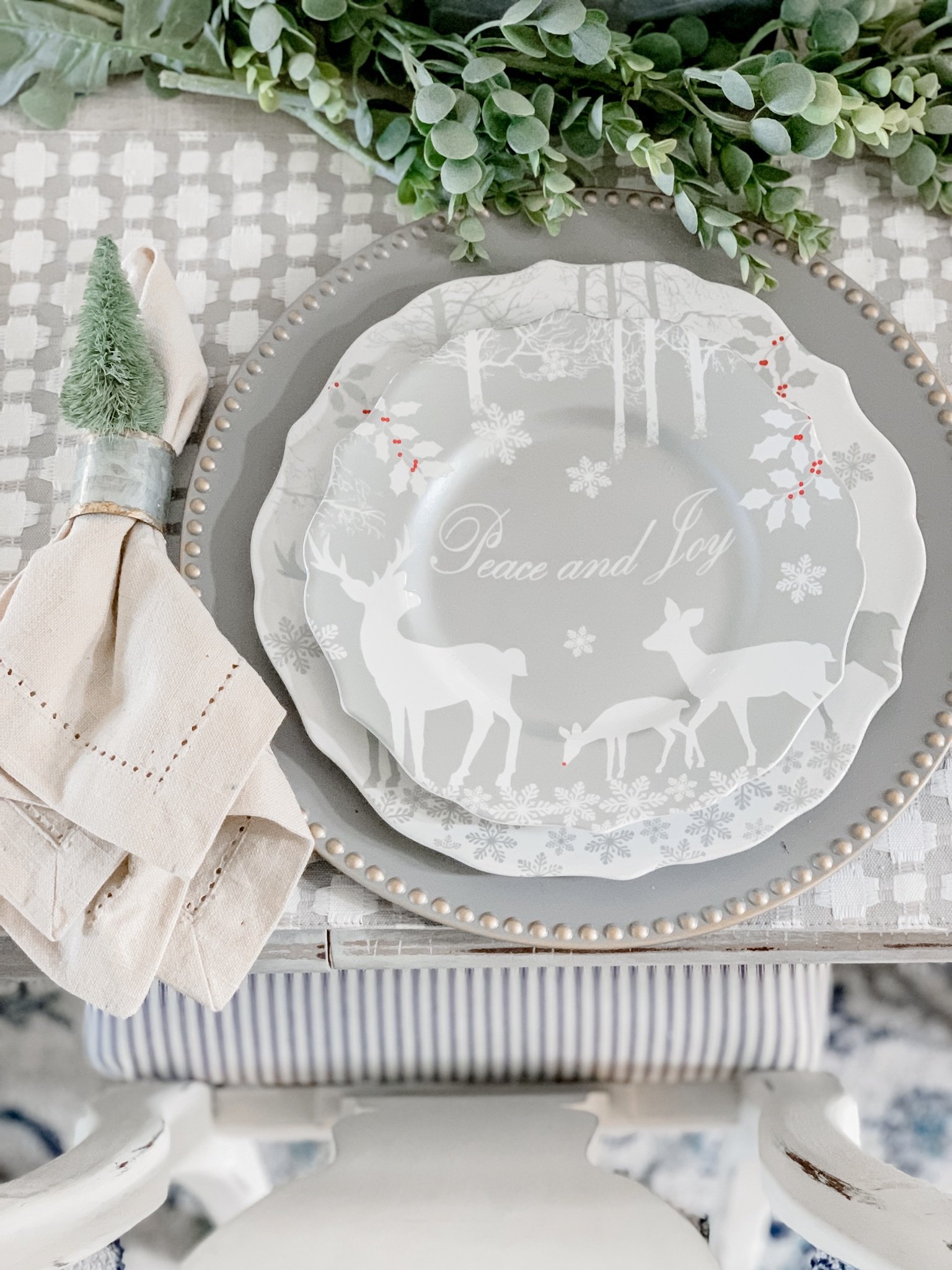 Neutral Christmas dining room decor table setting