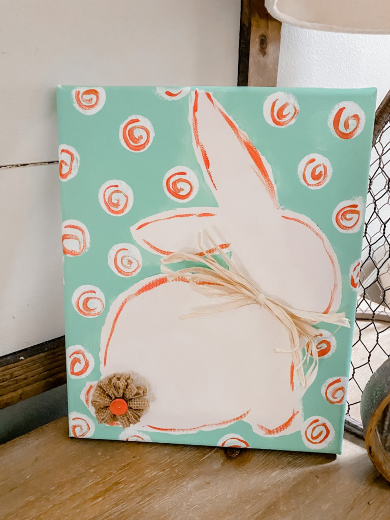 Cute painted bunny on canvas