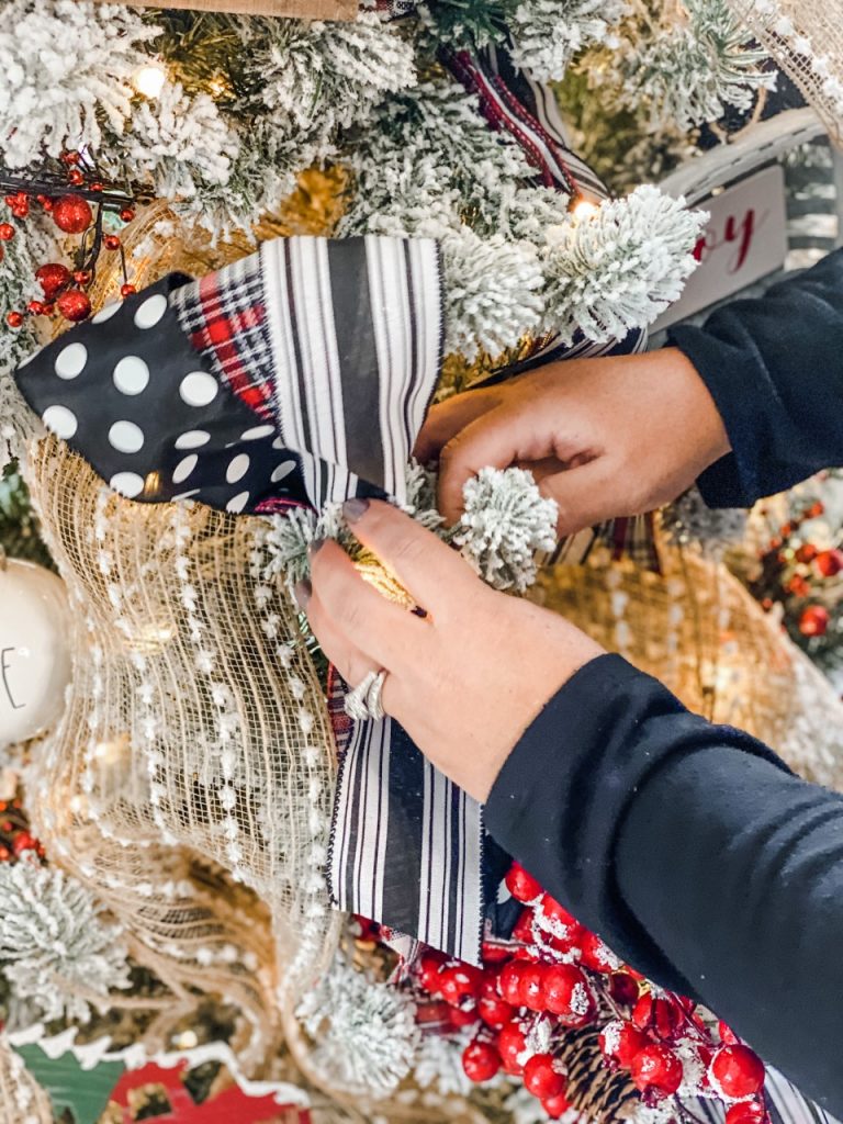 Flocked tree with ribbon