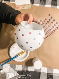 glass vase being painted