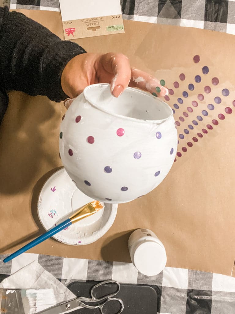 glass vase being painted