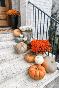 Fall front porch cascading pumpkins