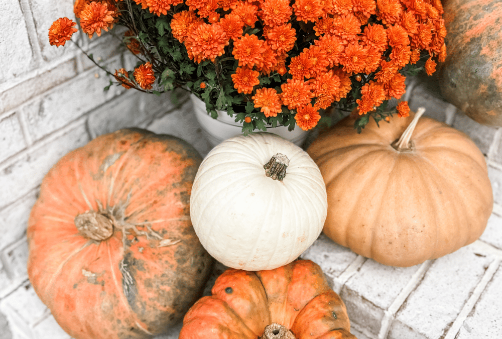 Fall front porch with cascading pumpkins