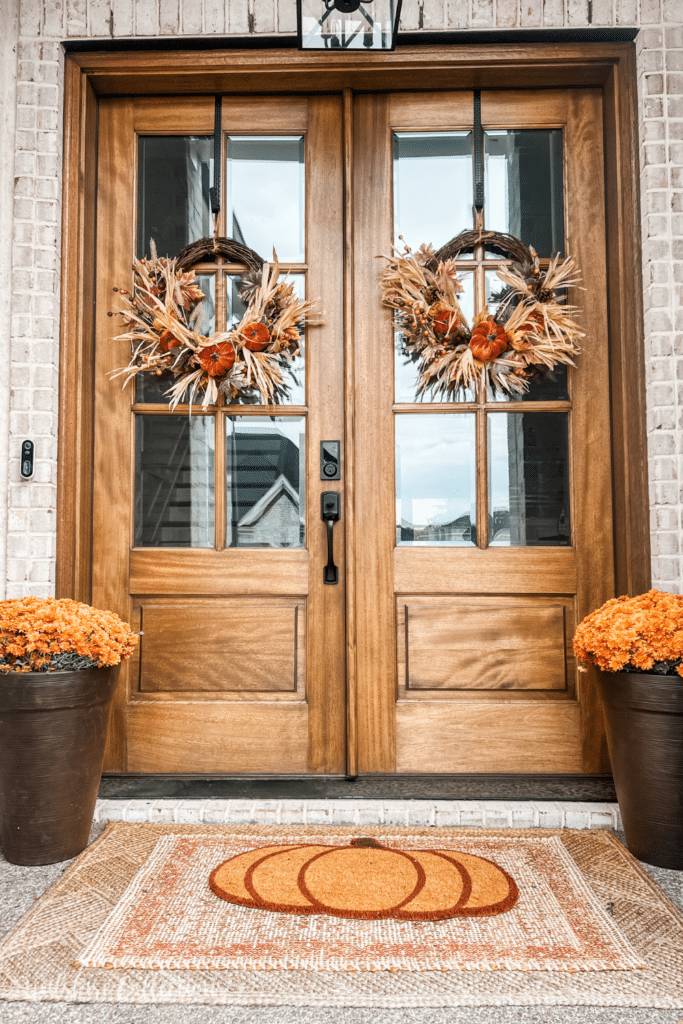 Fall front porch cascading pumpkins